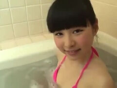Cute teen in thong bikini and bath