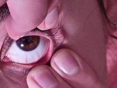 Cum container gets full cumshot in her open eye while talking