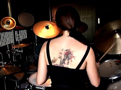 Lesbian girl with drums showing off her perfect body