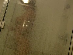 Sexy chick with big boobs filmed in the shower by bf