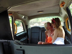 Busty lesbians make out in the cab