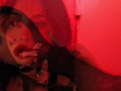 Goth with fake lips teases and fucks a toy