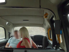 Whore Suzi Grande with fake tits pleases a taxi driver in a car