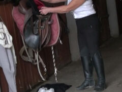 Kinky mama playing with herself in a barn