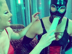 Sissy in latex receives an intense smoky blowjob lesson from domineering mistress