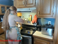 Busty redhead tradwife prepares husband's breakfast wearing only an apron