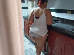 Spying on my curvy stepmom as she cleans the kitchen gets me in the mood!