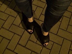 Crossdresser in very high platform shoes