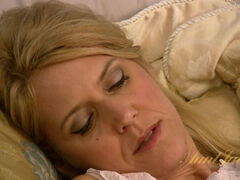 Trish masturbates in the bed for R. Williams.