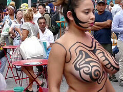 stunning bare-chested woman Getting Painted