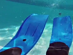 Hot brunette slut Candy swims underwater