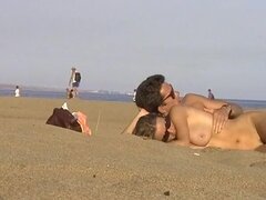 Voyeur camera catches nude lovers on the beach