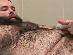 Gay furry bear Teddy Wilder masturbates in the bathtub and shows off his big balls