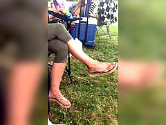 candid teacher's wondrous tan soles outside (not my vid)