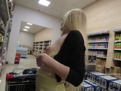 Skimpy dress, pantyless exhibitionist flashes in the supermarket for all to see!