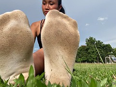 Asian girl with smelly sweaty white socks and barefoot