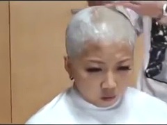 Two Japanese men shaved their heads