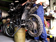 Russian MECHANIC repairs a MOTORCYCLE in the garage, gets excited and FUCKS silicone ass