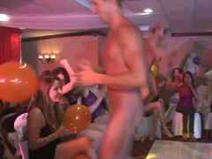 Hot stripper guy with a cowboy hat entertains a group of ladies