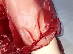 Masturbation with cum in a shiny red Christmas dress