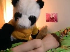 Big plushy panda comes alive and girl takes care of fake cock