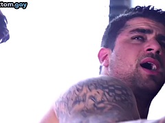 Gay tattooed muscleman getting his anal hole fucked by a hairy hunk