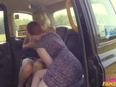 Redhead and milf have sexy taxi fun