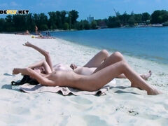 Preatty young nudist chicks have fun at the beach