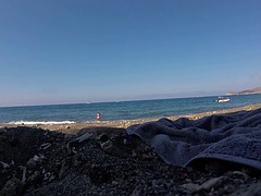 Swimming on the nude beach of Santorini, Greece