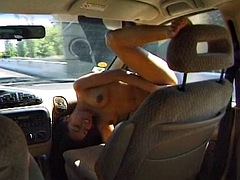 Hot French ebony sucking a white cock in the car