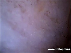 Sensational girl gets filmed inside her pink vagina while she cums