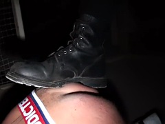 Submissive gay fucked in the basement by a jock in a leather strap-on