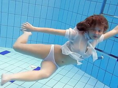 Dripping wet body Zuzanna submerged underwater