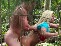 Voyeur films a muscular bull fucking the platinum blonde in woods