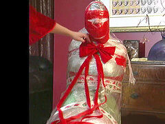 mummified wrap merry christmas