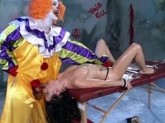 Well hung clown fucks a costumed porn star in his room