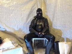 Getting off in shiny rubber on ebony skin