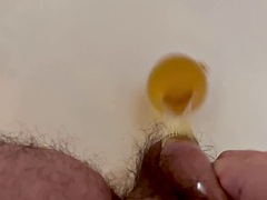 Hot yellow morning piss in a condom