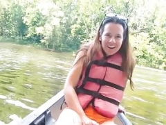 Housewife masturbates in public on canoe.