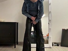 Sissy in leather bell-bottoms and denim blouse