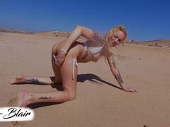 inked blond at the beach