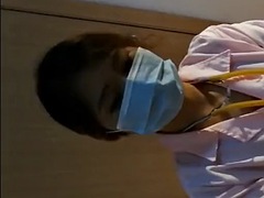 Beautiful Female Surgeon With Surgical Gloves Fisting