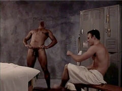Nude gay massage with dark-skinned man receiving a handjob