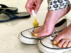 preparing for my next shoot: Painting toenails yellow