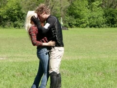 Horsewoman says good night to man and then they turn to kiss