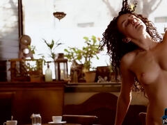 Curly hair MILF brunette gets naked during coffee break