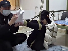 Chinese bondage and tickling in white socks