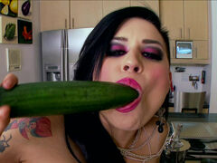 Bitch Eva Angelina with big tits fucks herself with a big cucumber