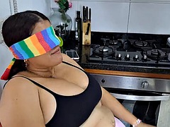 I play with my stepmom in the kitchen and put my cock in her mouth