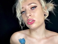 Blonde does a topless ASMR boob massage